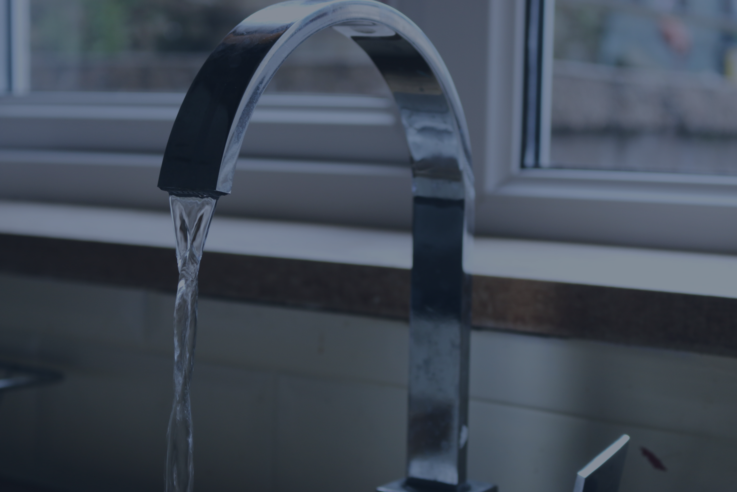 Tap with running water to highlight water scarcity